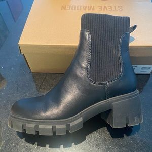 Black Steve Madden heeled boots (only worn once)